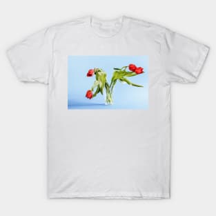 Wilted tulip flowers in the glass T-Shirt